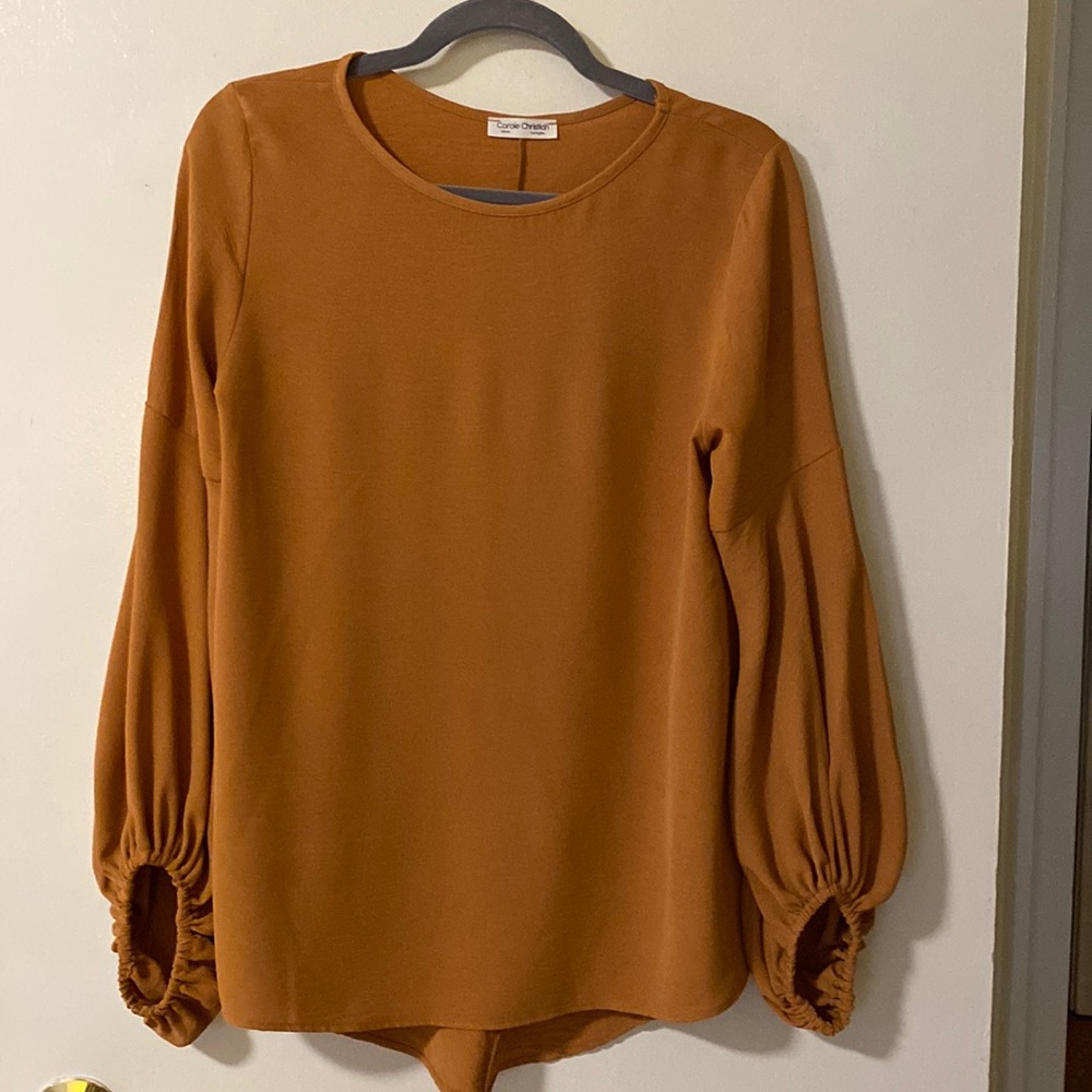 Carol Christian small boutique bubble sleeve blouse in gold.